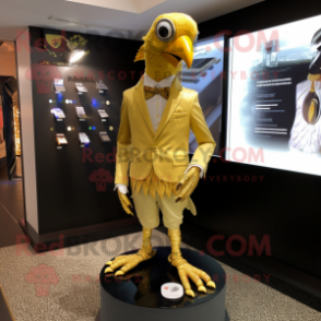 Gold Quail mascot costume character dressed with a Blazer and Shoe clips