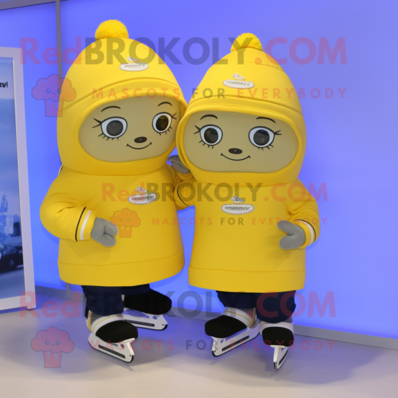 Lemon Yellow Pair Of Ice Skates mascot costume character dressed with a Hoodie and Beanies