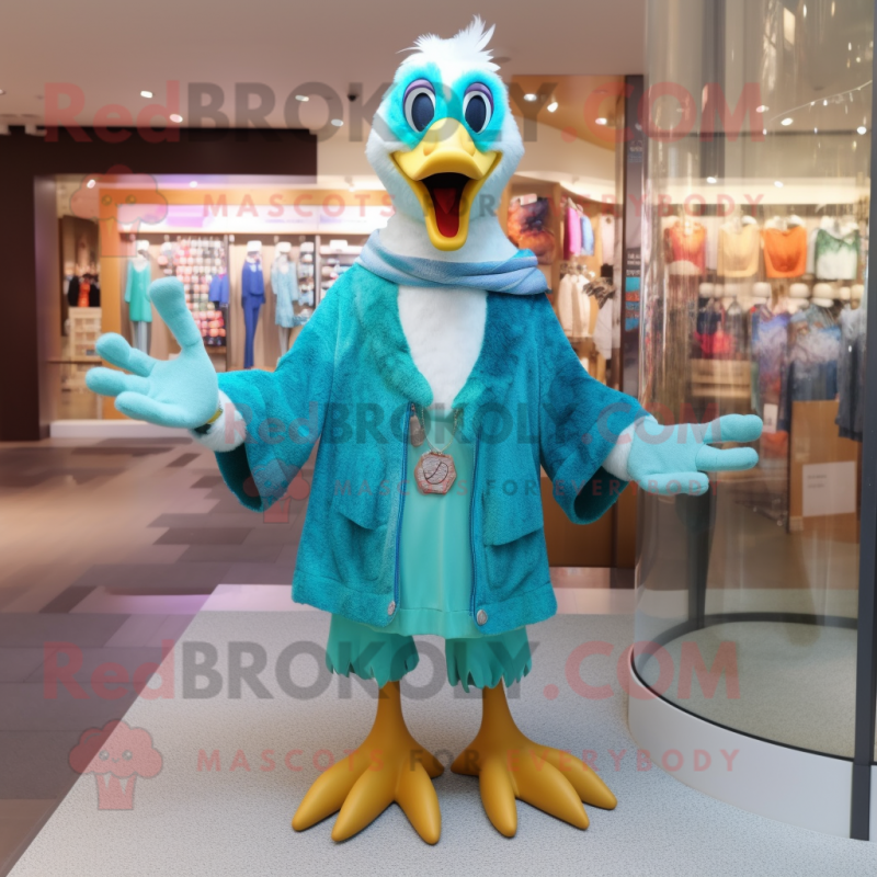 Turquoise Goose mascot costume character dressed with a Cardigan and Brooches