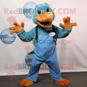 nan Komodo Dragon mascot costume character dressed with a Dungarees and Beanies