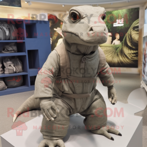 nan Komodo Dragon mascot costume character dressed with a Dungarees and Beanies