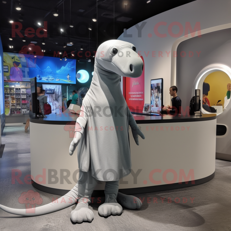 Gray Diplodocus mascot costume character dressed with a Shorts and Shawls