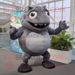 Gray Piranha mascot costume character dressed with a Yoga Pants and Gloves