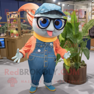 Peach Swordfish mascot costume character dressed with a Denim Shirt and Eyeglasses