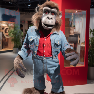 Red Baboon mascot costume character dressed with a Denim Shirt and Tie pins