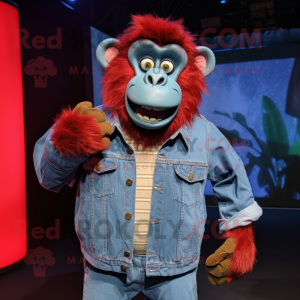 Red Baboon mascot costume character dressed with a Denim Shirt and Tie pins