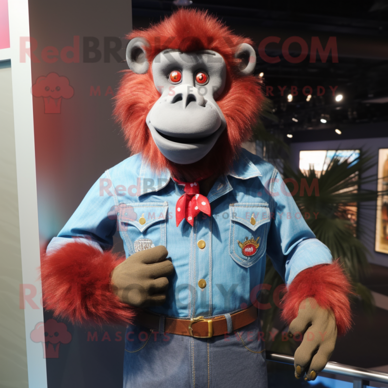 Red Baboon mascot costume character dressed with a Denim Shirt and Tie pins Red Baboon mascot costume character dressed with a Denim Shirt and Tie pins
