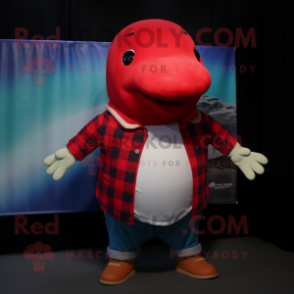 Red Humpback Whale mascot costume character dressed with a Flannel Shirt and Caps