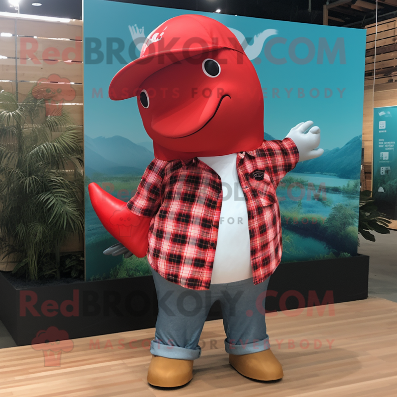 Red Humpback Whale mascot costume character dressed with a Flannel Shirt and Caps