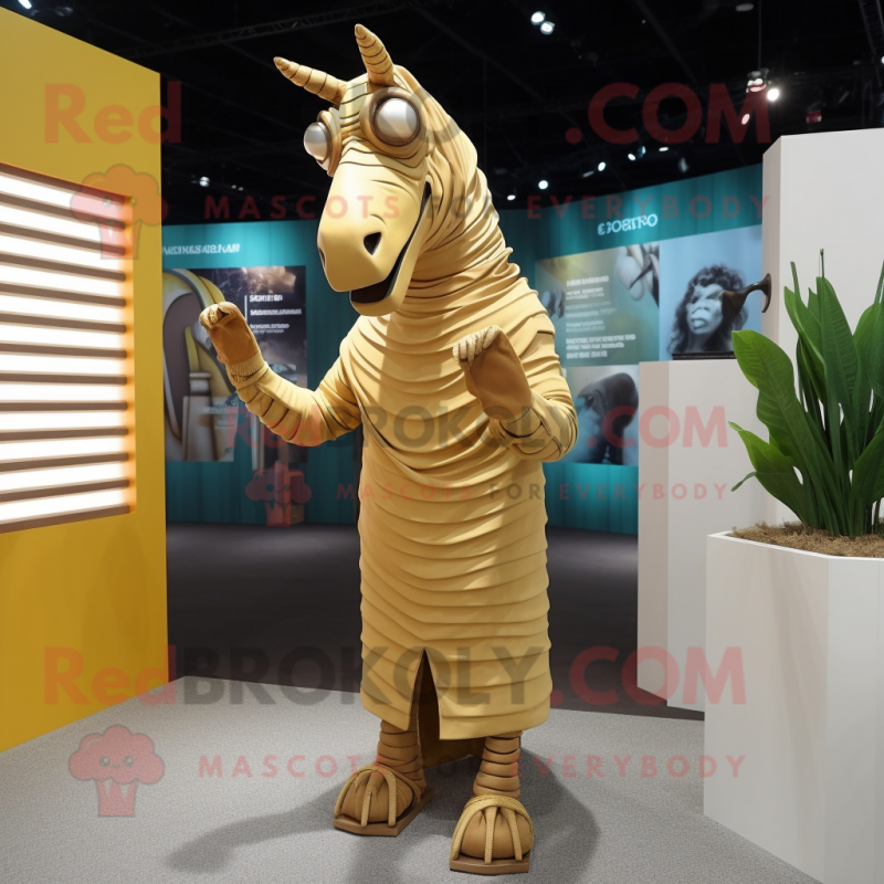 Gold Quagga mascot costume character dressed with a Romper and Shawl pins Gold Quagga mascot costume character dressed with a Romper and Shawl pins