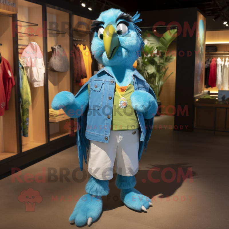 Turquoise Parrot mascot costume character dressed with a Boyfriend Jeans and Suspenders Turquoise Parrot mascot costume character dressed with a Boyfriend Jeans and Suspenders
