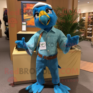 Turquoise Parrot mascot costume character dressed with a Boyfriend Jeans and Suspenders