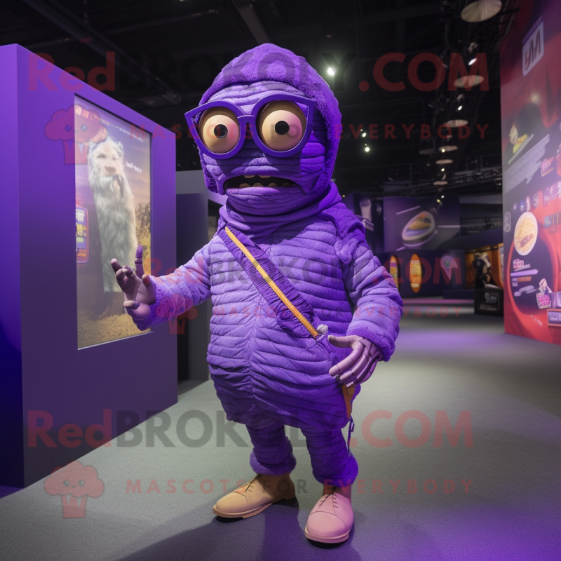 Purple Mummy mascot costume character dressed with a Bomber Jacket and Eyeglasses Purple Mummy mascot costume character dressed with a Bomber Jacket and Eyeglasses