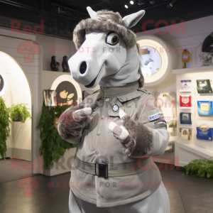 Gray Horseshoe mascot costume character dressed with a Parka and Rings