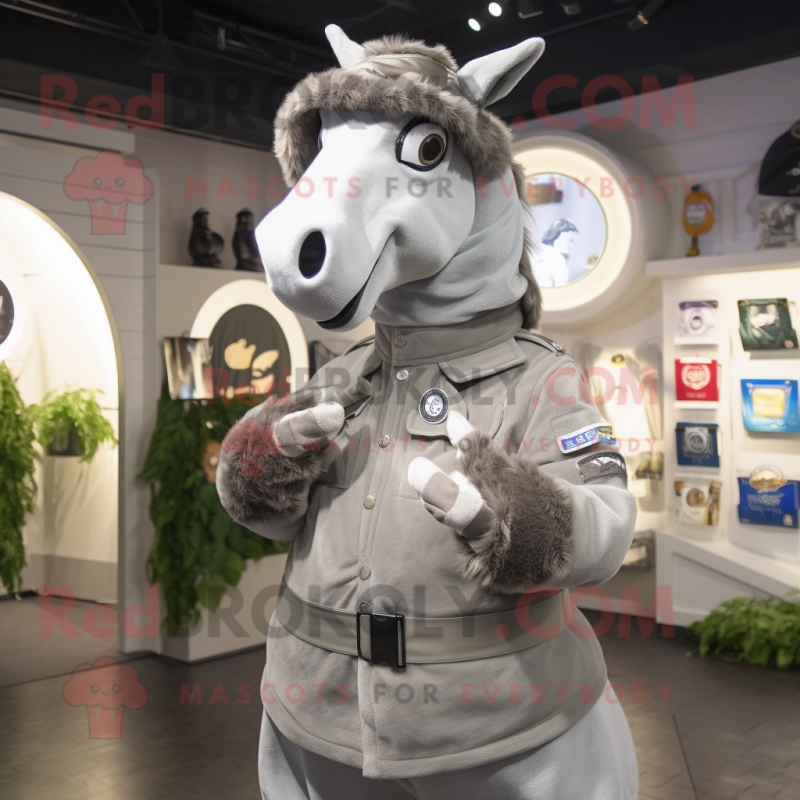 Gray Horseshoe mascot costume character dressed with a Parka and Rings Gray Horseshoe mascot costume character dressed with a Parka and Rings