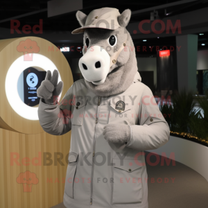 Gray Horseshoe mascot costume character dressed with a Parka and Rings