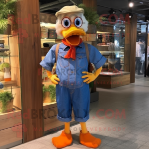 Orange Muscovy Duck mascot costume character dressed with a Chambray Shirt and Cummerbunds