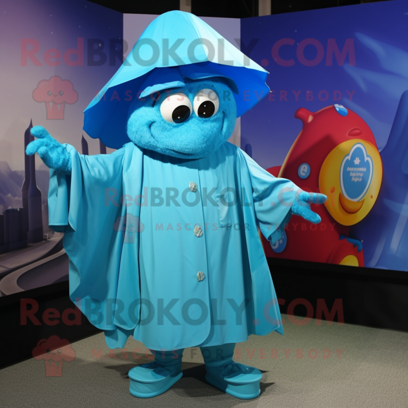 Cyan Momentum mascot costume character dressed with a Raincoat and Shawls Cyan Momentum mascot costume character dressed with a Raincoat and Shawls