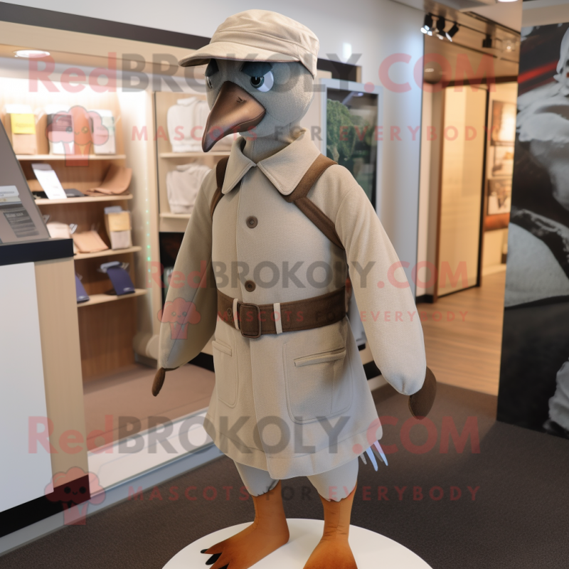 Tan Pigeon mascot costume character dressed with a Dress Pants and Beanies