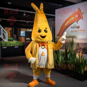 Gold Carrot mascot costume character dressed with a Graphic Tee and Lapel pins