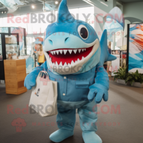 Turquoise Megalodon mascot costume character dressed with a Poplin Shirt and Tote bags