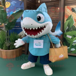 Turquoise Megalodon mascot costume character dressed with a Poplin Shirt and Tote bags