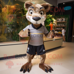 Brown Thylacosmilus mascot costume character dressed with a Running Shorts and Hair clips