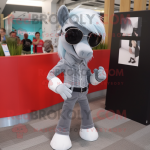 Silver Mare mascot costume character dressed with a Skinny Jeans and Sunglasses