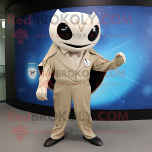 Beige Manta Ray mascot costume character dressed with a Suit Pants and Smartwatches