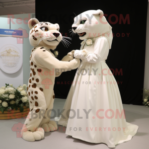 Cream Jaguar mascot costume character dressed with a Wedding Dress and Watches