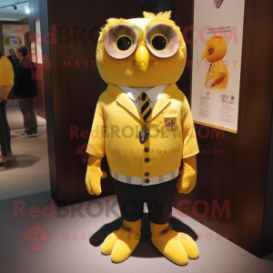 Yellow Owl mascot costume character dressed with a Polo Tee and Lapel pins