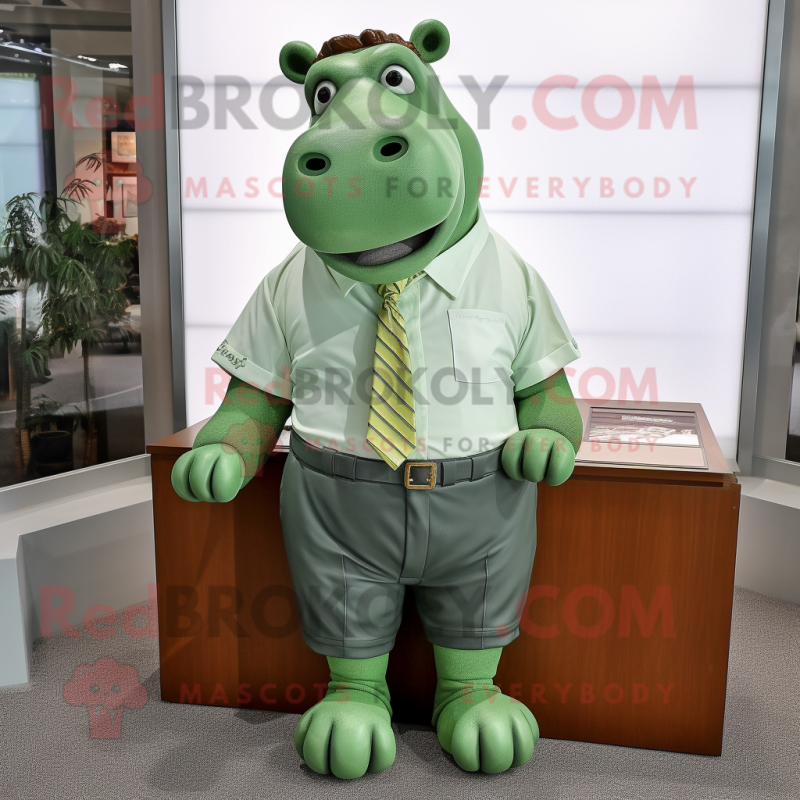 Green Hippopotamus mascot costume character dressed with a Oxford Shirt and Cufflinks