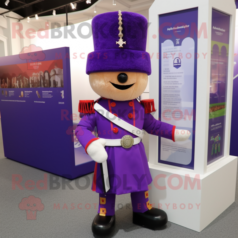 Purple British Royal Guard mascot costume character dressed with a Cardigan and Scarves Purple British Royal Guard mascot costume character dressed with a Cardigan and Scarves