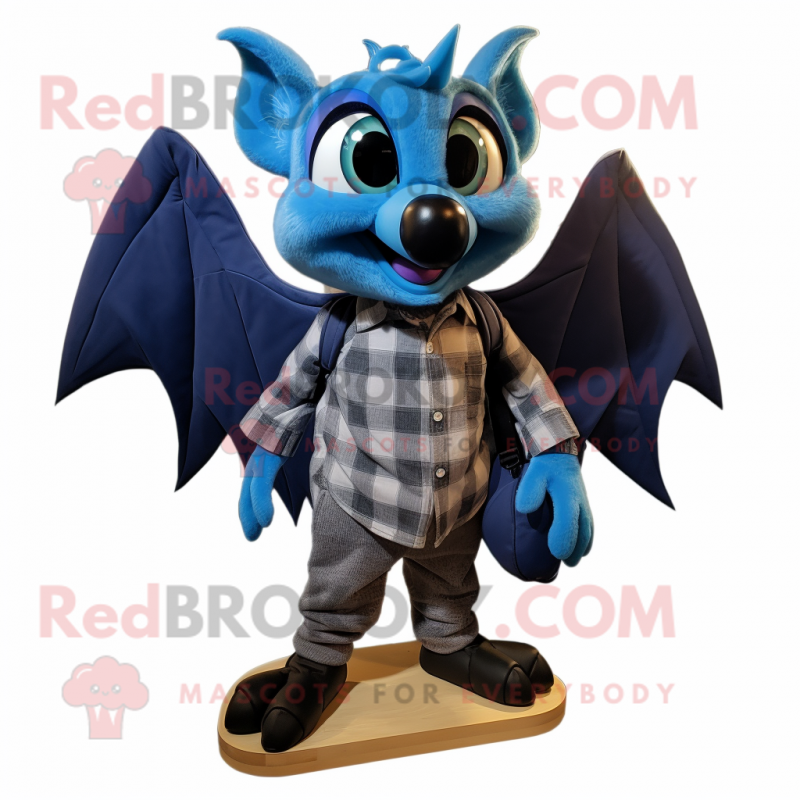 Blue Bat mascot costume character dressed with a Flannel Shirt and Shoe clips Blue Bat mascot costume character dressed with a Flannel Shirt and Shoe clips