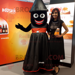 Black Tikka Masala mascot costume character dressed with a Cocktail Dress and Keychains