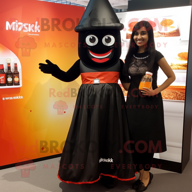 Black Tikka Masala mascot costume character dressed with a Cocktail Dress and Keychains Black Tikka Masala mascot costume character dressed with a Cocktail Dress and Keychains
