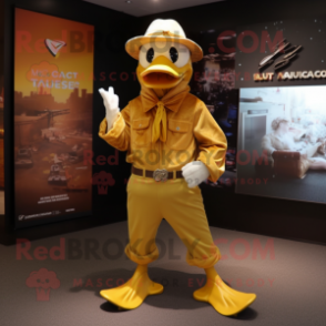 Gold Muscovy Duck mascot costume character dressed with a Flare Jeans and Gloves