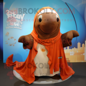 Brown Whale mascot costume character dressed with a Cover-up and Shawls