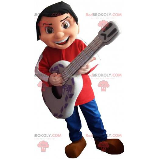 Mascota de Miguel Rivera, el niño músico de
