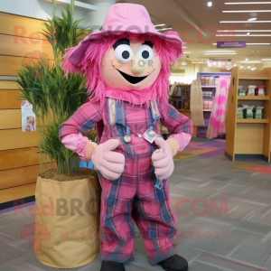 Pink Scarecrow mascot costume character dressed with a Flannel Shirt and Coin purses