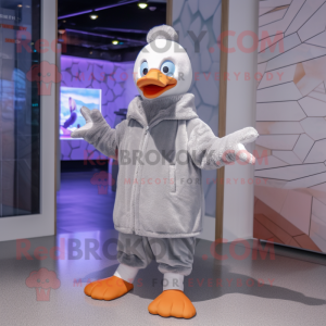 Silver Goose mascot costume character dressed with a Coat and Beanies