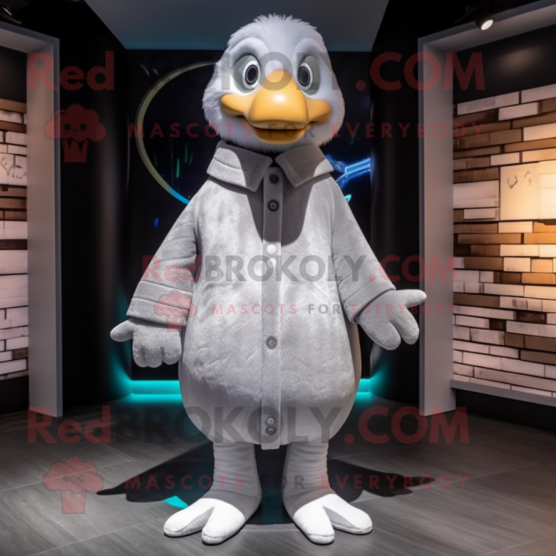 Silver Goose mascot costume character dressed with a Coat and Beanies