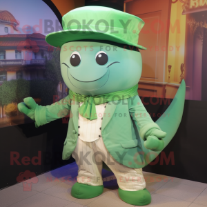 Green Whale mascot costume character dressed with a Poplin Shirt and Hat pins