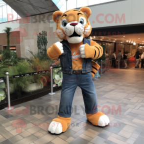 Peach Saber-Toothed Tiger mascot costume character dressed with a Bootcut Jeans and Bracelet watches