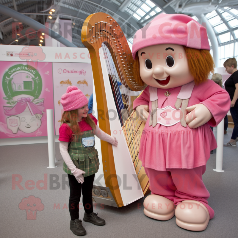 Pink Celtic Harp mascot costume character dressed with a Dungarees and Watches Pink Celtic Harp mascot costume character dressed with a Dungarees and Watches