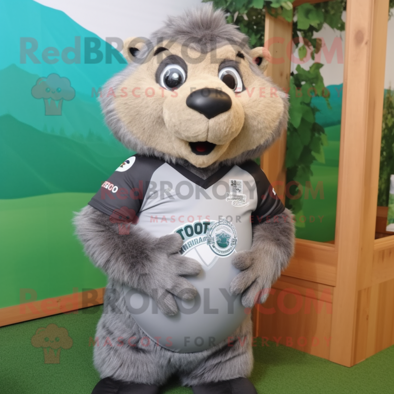 Gray Marmot mascot costume character dressed with a Rugby Shirt and Hair clips