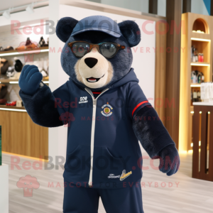 Navy Spectacled Bear mascot costume character dressed with a Sweatshirt and Eyeglasses