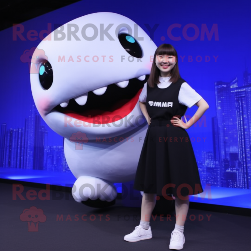 Black Beluga Whale mascot costume character dressed with a Mini Skirt and Foot pads