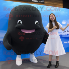 Black Beluga Whale mascot costume character dressed with a Mini Skirt and Foot pads