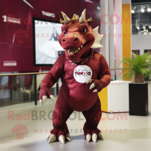 Maroon Triceratops maskot...